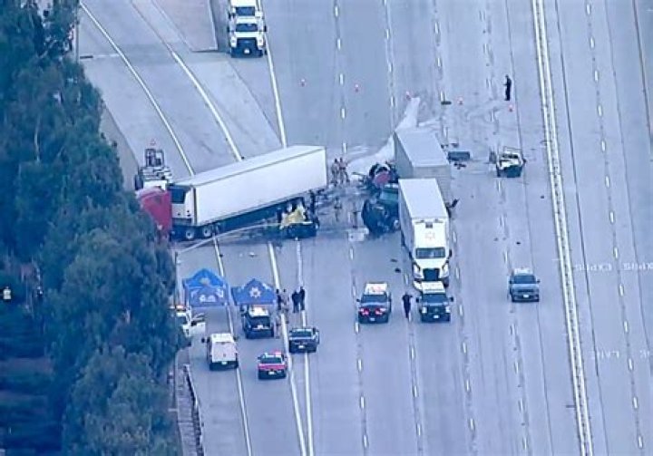 Shocking Video Shows Moment Cargo Train Crashes Into Semi-Truck