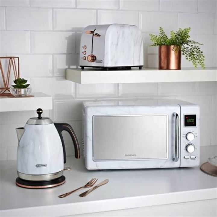Shoppers are going wild for B&M's new marble kitchen accessories range with a toaster and kettle in the trendy print