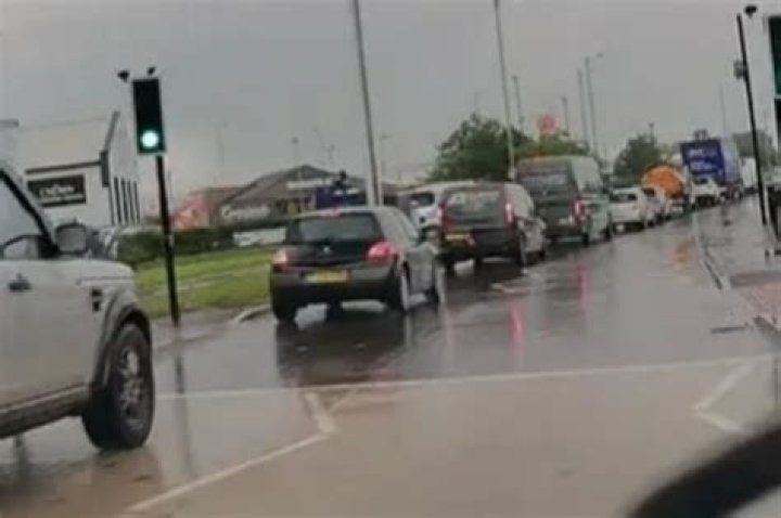 Watch driver use controversial slingshot roundabout method to enrage motorists... before people spot a very obvious flaw