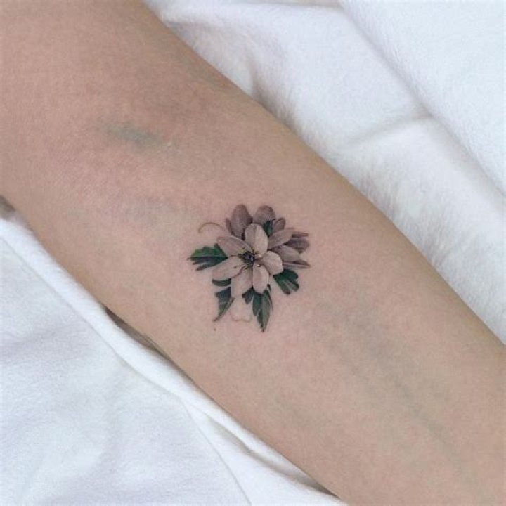 Blooming Beauty: The Allure Of Small Flower Tattoos