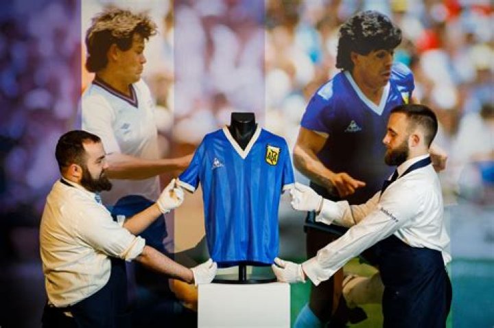 Amazing story behind Maradona's 'Hand of God' shirt that was so poorly made he branded it a 'joke' before £7m sale