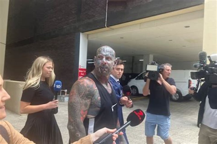 ‘World’s most tattooed biker’ is so terrifying cops have ordered him to cover himself with makeup