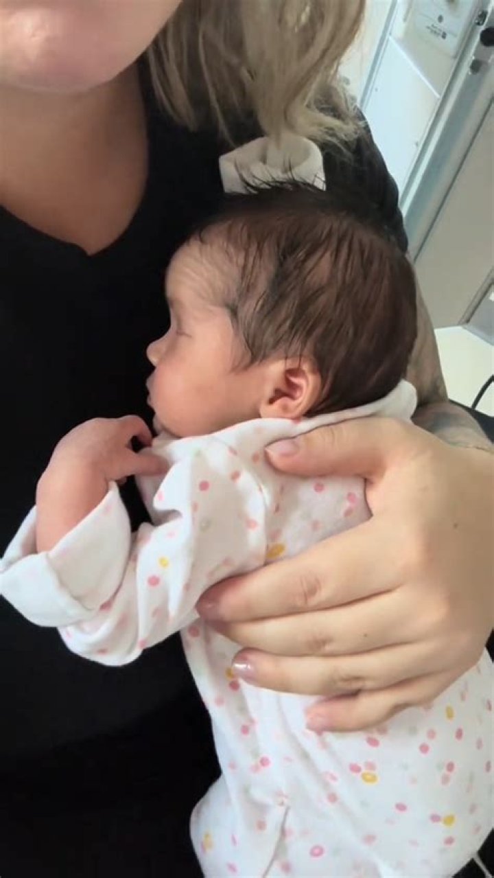 Teen Mom Kailyn Lowry cuddles up to newborn daughter Valley in matching pajamas after bringing baby twin home from NICU