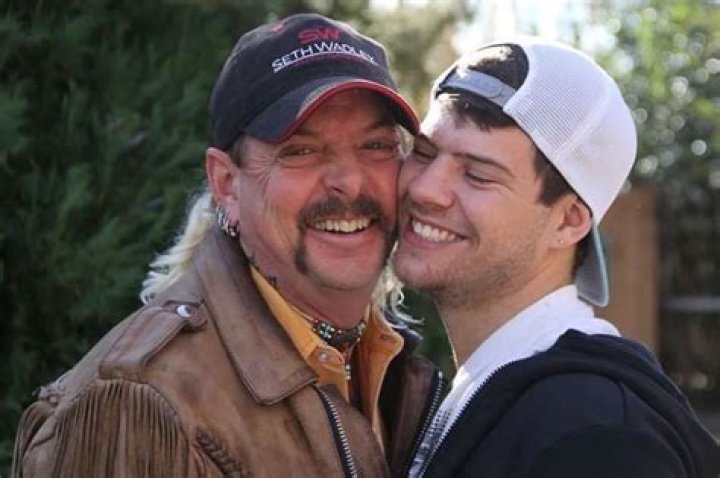 Tiger King Joe Exotic’s husband Dillon Passage kisses Too Hot To Handle’s Bryce Hirschberg during wild boat party – The US Sun