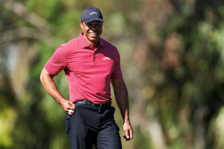Tiger Woods Poses Shirtless as ‘Mac Daddy Santa’