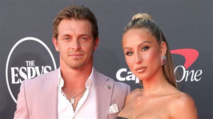 TikTok Star Alix Earle and Braxton Berrios Kiss in Steamy Beach Photo 