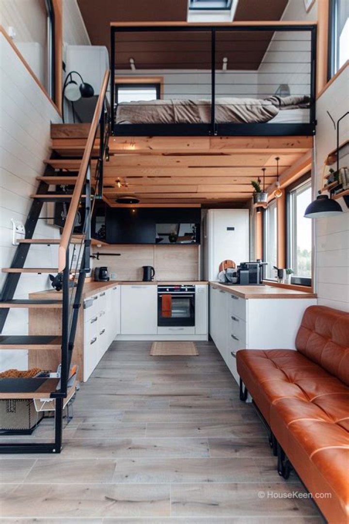I live in a tiny home for only $725 a month - it has two lofts, high ceilings, and I can tow it anywhere I want