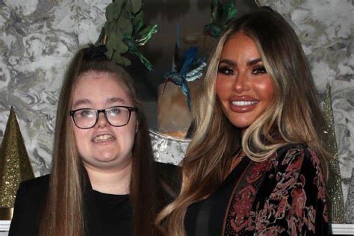 Chloe Sims poses with rarely seen daughter Madison, 15, at family Christmas party