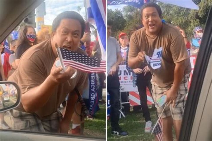Trump fan accused of voter intimidation after waving 'SWORD' at driver and screaming ‘we’ve got your plates’ at polls