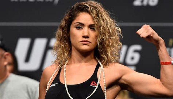 Ex-UFC beauty Pearl Gonzalez poses naked with fruit roll-up sweets covering boobs in 'crazy' way to get over loss