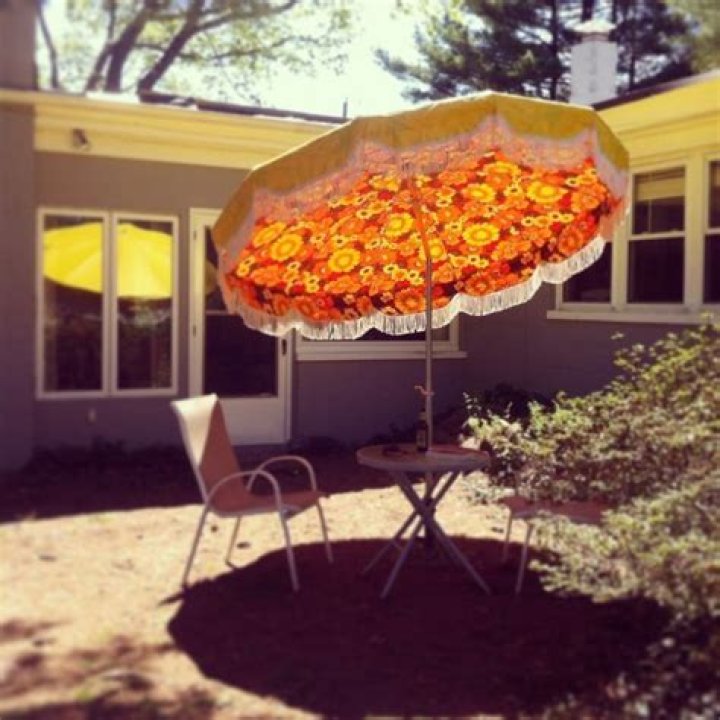 Discover The Charm Of Vintage Patio Umbrellas: Perfect For Shaded Comfort