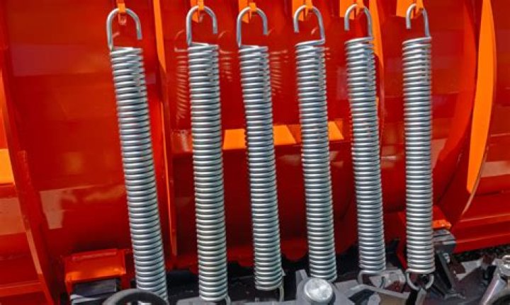 What is a coil spring insulator?