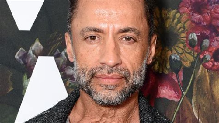 Who is Kamar de los Reyes' wife, Sherri Saum?