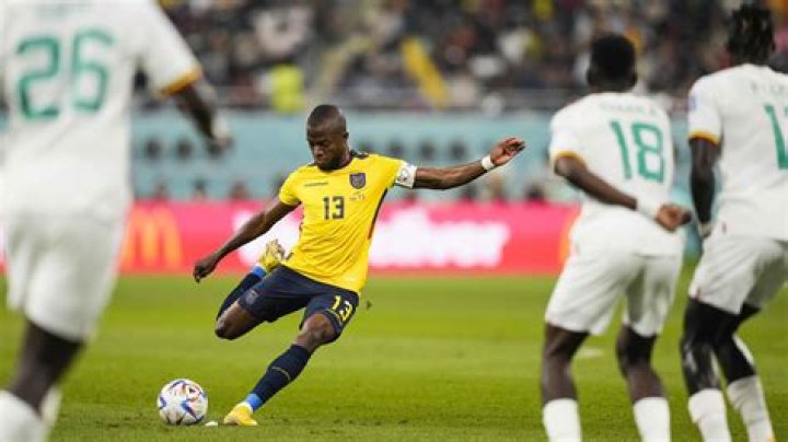 Why do soccer players lay behind the wall for a free kick?